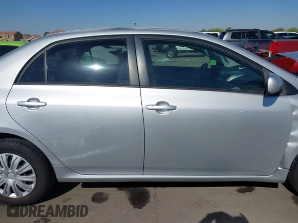 2011 Toyota Corolla L with VIN JTDBU4EE0B9151332, listed as a IAAI auction lot 41970433 with 113,157 mi miles. Bid and sale history available at carsss.com. Image 13.