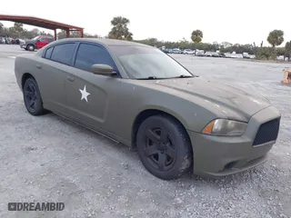 2014 Dodge Charger Police with VIN 2C3CDXAG9EH221609, listed as a IAAI auction lot 41324904 with 1 mi miles. Bid and sale history available at carsss.com. Image 1.