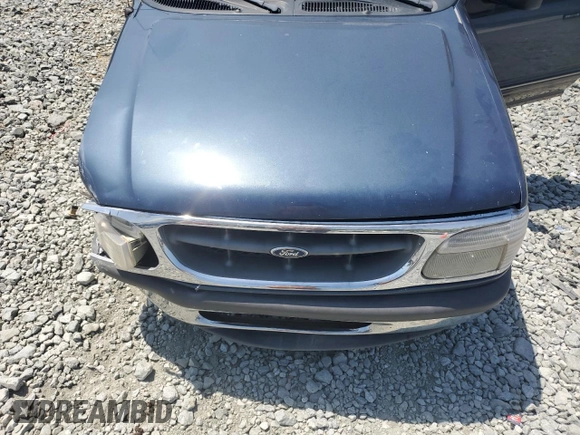 1998 Ford Explorer XL z VIN 1FMZU34E0WZB14244, wystawiony jako Copart lot #53912095 z przebiegiem 319 120 mil mil oraz Szkoda całkowita • Salvage title. Historia ofert i sprzedaży dostępna na DreamBid. Obrazek 12.
