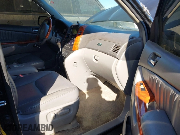 2009 Toyota Sienna XLE with VIN 5TDZK22C69S273555, listed as a IAAI auction lot 41276221 with 129,160 mi miles and . Bid and sale history available at DreamBid. Image 5.