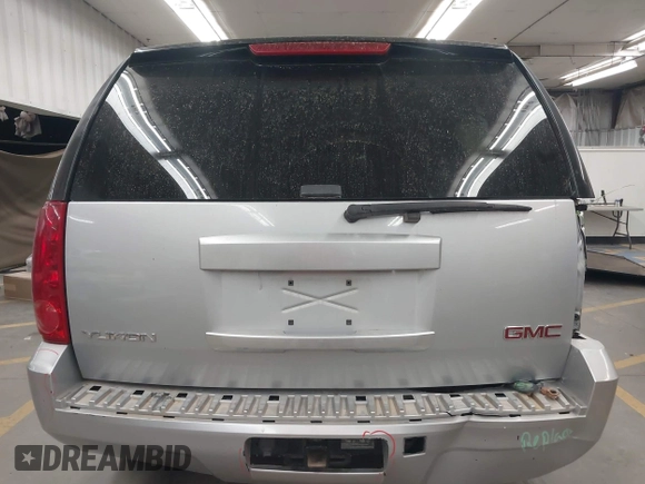 2013 GMC Yukon SLE with VIN 1GKS1AE09DR353945, listed as a IAAI auction lot 41900111 with 109,655 mi miles. Bid and sale history available at carsss.com. Image 16.