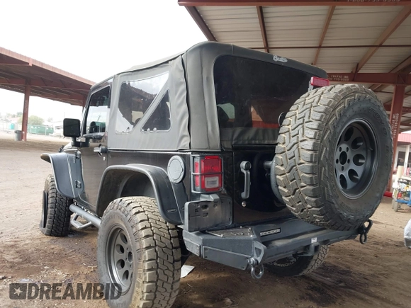 2011 Jeep Wrangler Rubicon with VIN 1J4BA6D13BL545343, listed as a IAAI auction lot 40980056 with 107,207 mi miles and . Bid and sale history available at carsss.com. Image 3.