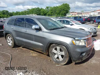 2011 Jeep Grand Cherokee Overland Summit with VIN 1J4RR6GT3BC713812, listed as a IAAI auction lot 42398585 with 208,476 mi miles and . Bid and sale history available at DreamBid. Image 13.