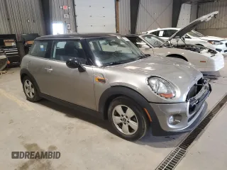 2017 MINI Hardtop Cooper with VIN WMWXP5C30H2F60940, listed as a Copart auction lot 56475935 with 66,925 mi miles and Salvage title. Bid and sale history available at DreamBid. Image 4.