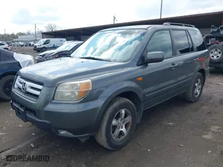 2007 Honda Pilot EX-L with VIN 5FNYF28527B022848, listed as a IAAI auction lot 42010116 with 240,277 mi miles. Bid and sale history available at carsss.com. Image 2.