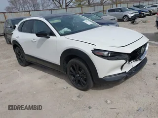 2022 Mazda CX-30 2.5 Turbo with VIN 3MVDMBAY3NM400501, listed as a IAAI auction lot 41840120 with 34,150 mi miles and . Bid and sale history available at carsss.com. Image 1.
