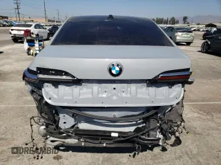 2023 BMW 7 Series 740i with VIN WBA23EH09PCM67327, listed as a Copart auction lot 73387174 with 18,228 mi miles and Salvage Title. Bid and sale history available at carsss.com. Image 6.
