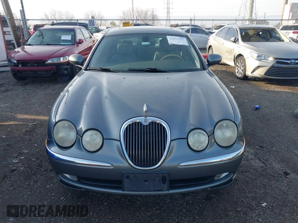 2003 Jaguar S-Type with VIN SAJEA01T23FM93839, listed as a IAAI auction lot 41891973 with 153,761 mi miles and . Bid and sale history available at DreamBid. Image 12.
