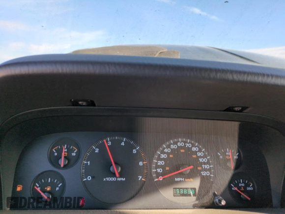 2001 Jeep Grand Cherokee Laredo with VIN 1J4GW48N21C570404, listed as a Copart auction lot 85996954 with 153,838 mi miles and Salvage title. Bid and sale history available at DreamBid. Image 9.
