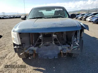 2012 Chevrolet Silverado 1500 Work Truck with VIN 1GCRKPE76CZ251752, listed as a Copart auction lot 68415394 with 148,397 mi miles and Salvage Title. Bid and sale history available at DreamBid. Image 5.
