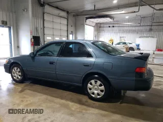 2000 Toyota Camry CE z VIN 4T1BG22K7YU744080, wystawiony jako Copart lot #56675105 z przebiegiem 226 154 mil mil oraz Szkoda całkowita • Salvage title. Historia ofert i sprzedaży dostępna na DreamBid. Obrazek 2.