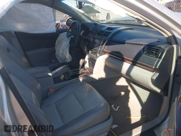 2014 Toyota Camry SE with VIN 4T1BK1FK6EU548176, listed as a IAAI auction lot 41392975 with 143,249 mi miles. Bid and sale history available at carsss.com. Image 5.