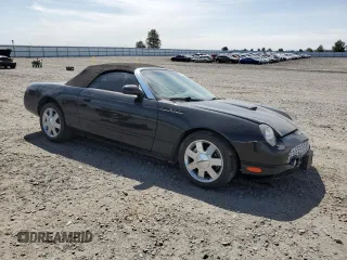 2002 Ford Thunderbird Hardtop Premium z VIN 1FAHP60A92Y117614, wystawiony jako Copart lot #59344735 z przebiegiem 83 723 mil mil oraz Szkoda całkowita • Salvage title. Historia ofert i sprzedaży dostępna na DreamBid. Obrazek 4.