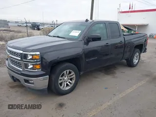 2014 Chevrolet Silverado 1500 LT with VIN 1GCVKREC8EZ325070, listed as a IAAI auction lot 41328199 with 164,009 mi miles and . Bid and sale history available at DreamBid. Image 2.