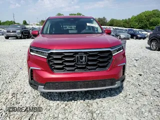 2023 Honda Pilot EX-L with VIN 5FNYG2H40PB003512, listed as a Copart auction lot 55291795 with 17,493 mi miles and Salvage title. Bid and sale history available at DreamBid. Image 14.