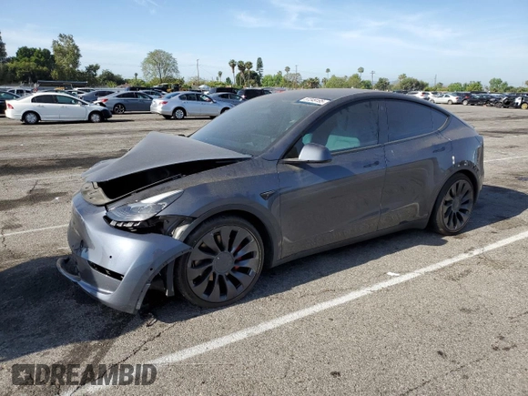 2022 Tesla Model Y Performance z VIN 7SAYGDEF1NF405329, wystawiony jako Copart lot #57249195 z przebiegiem 62 423 mil mil oraz Szkoda całkowita • Salvage title. Historia ofert i sprzedaży dostępna na DreamBid. Obrazek 1.