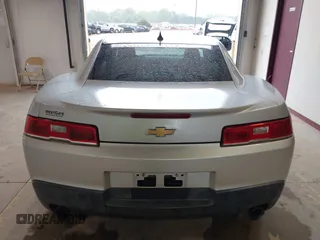 2014 Chevrolet Camaro LS z VIN 2G1FA1E36E9212973, wystawiony jako IAAI lot #41956457 z przebiegiem 159 370 mil mil oraz . Historia ofert i sprzedaży dostępna na DreamBid. Obrazek 16.