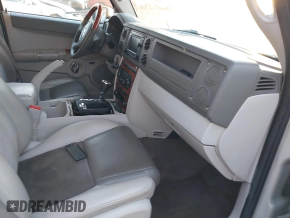 2007 Jeep Commander Overland z VIN 1J8HG68227C653826, wystawiony jako IAAI lot #40649706 z przebiegiem 225 538 mil mil oraz . Historia ofert i sprzedaży dostępna na DreamBid. Obrazek 5.