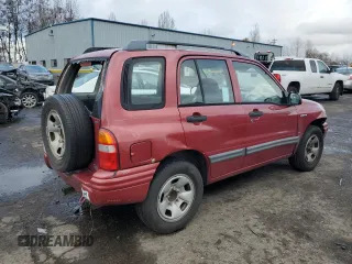 2000 Suzuki Vitara JX z VIN 2S3TD52V9Y6100173, wystawiony jako Copart lot #86200824 z przebiegiem Nie podano mil oraz Szkody całkowita. Historia ofert i sprzedaży dostępna na DreamBid. Obrazek 3.