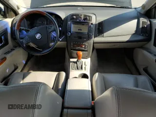 2004 Cadillac CTS with VIN 1G6DM577040103840, listed as a Copart auction lot 55284675 with 113,007 mi miles and Salvage title. Bid and sale history available at DreamBid. Image 8.