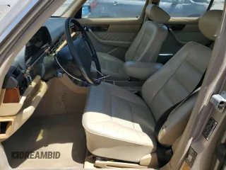1990 Mercedes-Benz 300 with VIN WDBCA24D1LA529716, listed as a Copart auction lot 56581335 with 122,286 mi miles and Salvage Title. Bid and sale history available at DreamBid. Image 7.