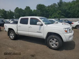2005 Toyota Tacoma with VIN 5TELU42N95Z023835, listed as a Copart auction lot 60819095 with 271,642 mi miles and Salvage title. Bid and sale history available at DreamBid. Image 4.