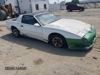 1991 Pontiac Firebird z VIN 1G2FS23E5ML239639, wystawiony jako Copart lot #54986095 z przebiegiem 154 017 mil mil oraz Tytuł czysty. Historia ofert i sprzedaży dostępna na DreamBid. Obrazek 4.