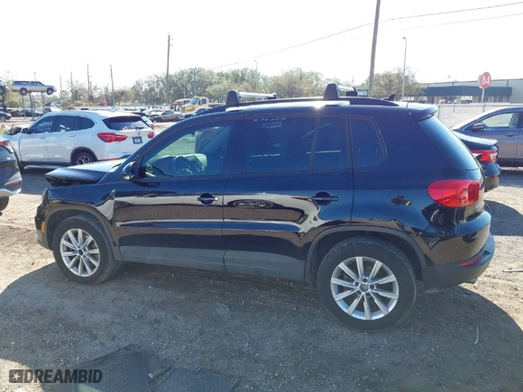 2017 Volkswagen Tiguan S with VIN WVGAV7AX2HK051246, listed as a IAAI auction lot 41665461 with 63,531 mi miles. Bid and sale history available at carsss.com. Image 14.