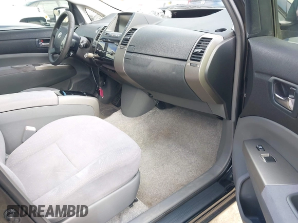 2007 Toyota Prius with VIN JTDKB20UX77629316, listed as a IAAI auction lot 42217496 with 158,006 mi miles and . Bid and sale history available at DreamBid. Image 5.