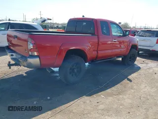 2014 Toyota Tacoma with VIN 5TFUU4EN7EX084785, listed as a IAAI auction lot 41879329 with 133,216 mi miles and . Bid and sale history available at DreamBid. Image 4.