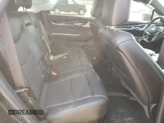 2020 Cadillac XT5 Premium Luxury AWD z VIN 1GYKNDRS4LZ142738, wystawiony jako Copart lot #61247675 z przebiegiem 60 353 mil mil oraz Szkoda całkowita • Salvage title. Historia ofert i sprzedaży dostępna na DreamBid. Obrazek 10.