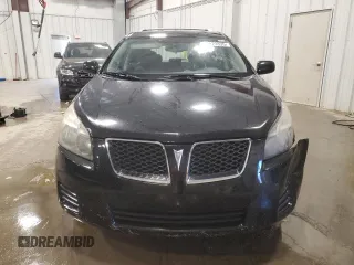 2009 Pontiac Vibe with VIN 5Y2SM670X9Z420525, listed as a Copart auction lot 52820335 with 213,412 mi miles and Non Repairable. Bid and sale history available at carsss.com. Image 5.