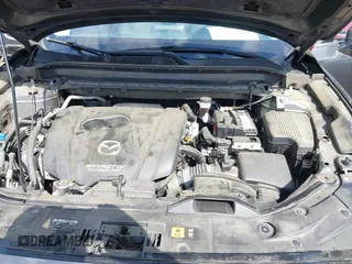 2019 Mazda CX-5 Grand Touring with VIN JM3KFBDM7K0619379, listed as a IAAI auction lot 42007107 with 209,590 mi miles. Bid and sale history available at carsss.com. Image 10.