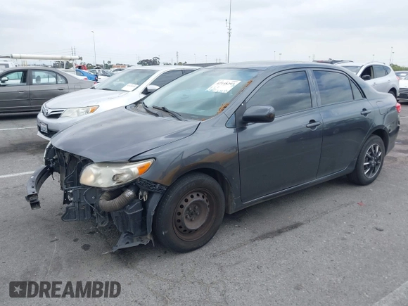 2010 Toyota Corolla with VIN 1NXBU4EE3AZ169217, listed as a IAAI auction lot 42148293 with 205,965 mi miles. Bid and sale history available at carsss.com. Image 2.
