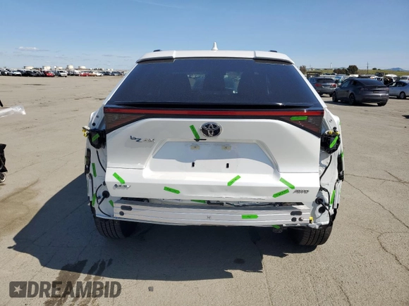 2024 Toyota bZ4X XLE with VIN JTMABACA8RA073861, listed as a Copart auction lot 50030475 with 6,465 mi miles and Salvage Title. Bid and sale history available at DreamBid. Image 6.