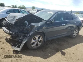 2010 Honda Crosstour EX-L z VIN 5J6TF1H52AL003915, wystawiony jako Copart lot #54265625 z przebiegiem 127 179 mil mil oraz Szkody całkowita. Historia ofert i sprzedaży dostępna na DreamBid. Obrazek 1.