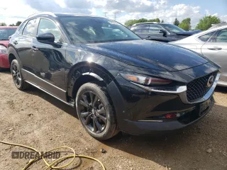 2022 Mazda CX-30 2.5 Turbo with VIN 3MVDMBAY0NM447128, listed as a Copart auction lot 54007924 with 10,596 mi miles and Salvage Title. Bid and sale history available at DreamBid. Image 4.