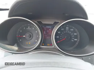 2012 Hyundai Veloster w/Black Int with VIN KMHTC6AD7CU049570, listed as a IAAI auction lot 42265051 with 79,896 mi miles and . Bid and sale history available at DreamBid. Image 7.