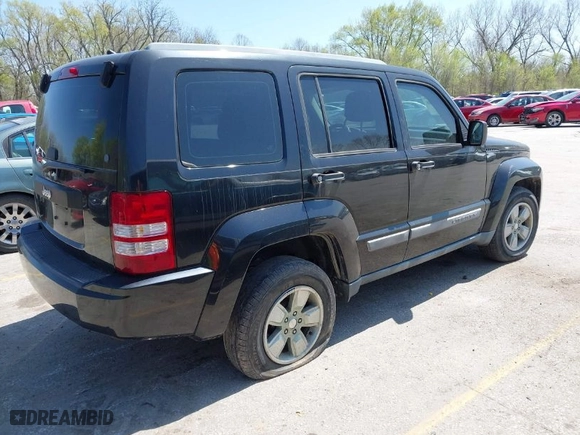 2012 Jeep Liberty Sport with VIN 1C4PJLAK9CW120779, listed as a IAAI auction lot 41901708 with 162,696 mi miles. Bid and sale history available at carsss.com. Image 4.