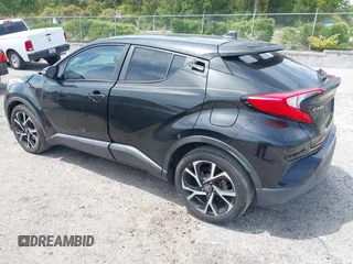 2018 Toyota C-HR XLE with VIN NMTKHMBX0JR008423, listed as a IAAI auction lot 42091445 with 124,811 mi miles. Bid and sale history available at carsss.com. Image 3.