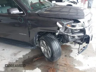2017 Chevrolet Tahoe LT with VIN 1GNSKBKC8HR326004, listed as a IAAI auction lot 42256494 with 101,486 mi miles and . Bid and sale history available at DreamBid. Image 6.
