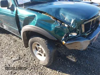 1998 Ford Ranger XL with VIN 1FTZR15U6WTA72360, listed as a IAAI auction lot 41233133 with 199,442 mi miles. Bid and sale history available at carsss.com. Image 6.