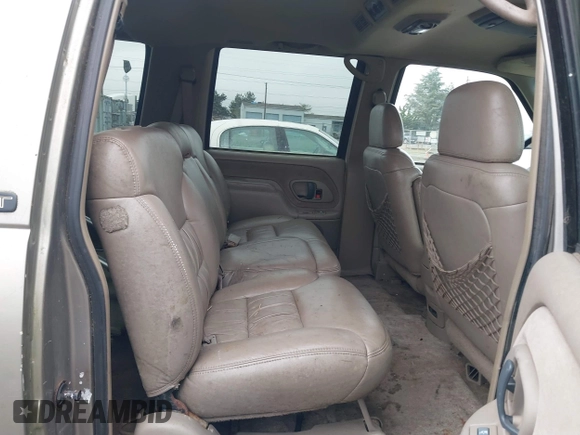 1999 Chevrolet Suburban z VIN 3GNFK16RXXG156463, wystawiony jako IAAI lot #41745169 z przebiegiem 165 541 mil mil oraz . Historia ofert i sprzedaży dostępna na DreamBid. Obrazek 8.