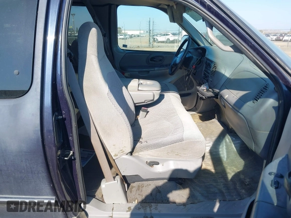 1999 Ford F-150 with VIN 2FTRX17L8XCB23329, listed as a IAAI auction lot 41448347 with 223,517 mi miles and . Bid and sale history available at DreamBid. Image 5.