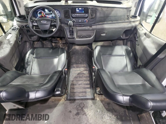 2023 Ford Transit Cargo с VIN 1FTBR2C80PKC00192, выставлен на аукционе Copart как лот 82952724 с пробегом 30 783 миль миль и Чистый • Clean title. История ставок и продаж доступна на DreamBid. Изображение 8.