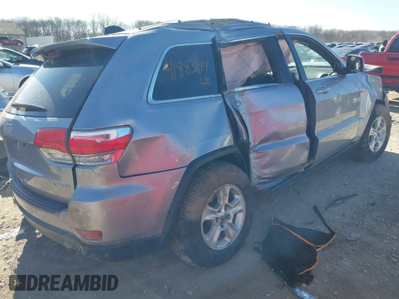 2014 Jeep Grand Cherokee Laredo with VIN 1C4RJFAG0EC289647, listed as a IAAI auction lot 41883914 with 176,501 mi miles and . Bid and sale history available at DreamBid. Image 4.