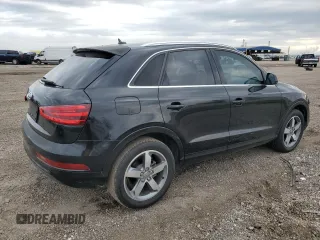 2015 Audi Q3 Premium Plus z VIN WA1BFCFS9FR002457, wystawiony jako Copart lot #87422994 z przebiegiem 135 890 mil mil oraz Szkoda całkowita • Salvage title. Historia ofert i sprzedaży dostępna na DreamBid. Obrazek 3.