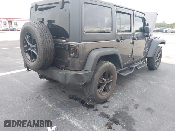 2018 Jeep Wrangler Unlimited Sport S with VIN 1C4BJWDG1JL810754, listed as a IAAI auction lot 42419199 with 74,901 mi miles and . Bid and sale history available at DreamBid. Image 6.