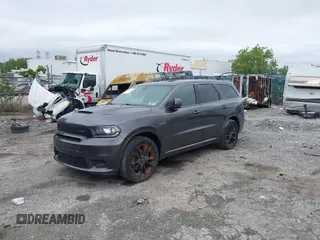2020 Dodge Durango R/T with VIN 1C4SDJCT2LC346952, listed as a IAAI auction lot 42451221 with 65,696 mi miles and . Bid and sale history available at DreamBid. Image 16.