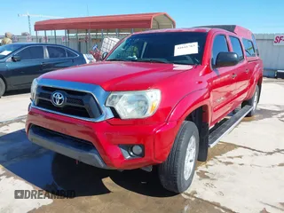 2014 Toyota Tacoma PreRunner with VIN 3TMKU4HN4EM041871, listed as a IAAI auction lot 41641763 with 148,968 mi miles and . Bid and sale history available at DreamBid. Image 2.